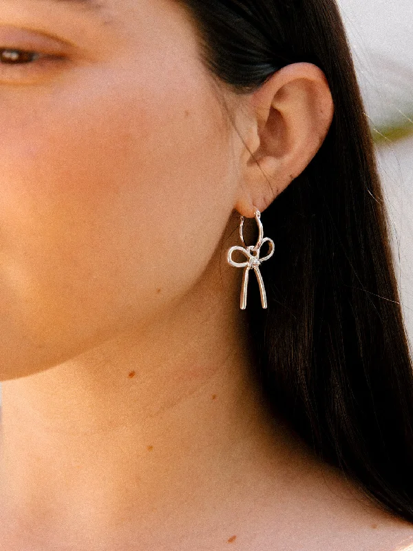 The Perfect Jewelry Piece At The Perfect Discount Pasta Bow Hoops - Silver