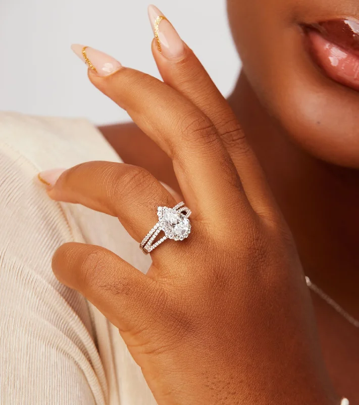 Shop Jewelry That Shines Without The High Price Aurora Pear Cut CZ Bride Set in 925 Sterling Silver Shop Jewelry That Shines Without The High Price Aurora Pear Cut CZ Bride Set in 925 Sterling Silver