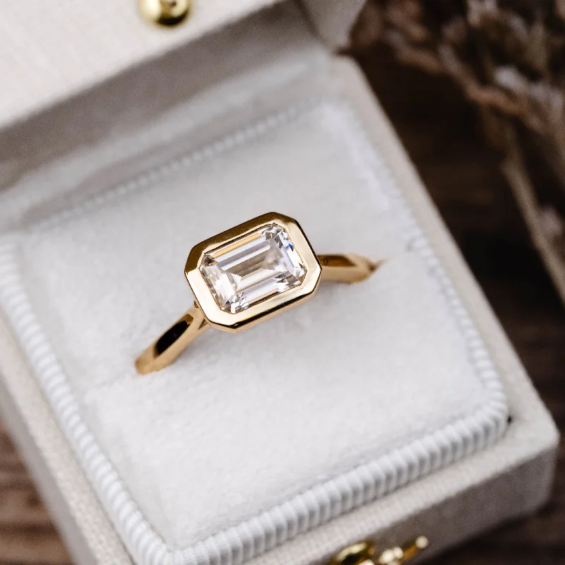 Shop Fine Jewelry With Amazing Deals The Adeline - Hidden Halo Emerald Cut Moissanite Engagement Ring with Bezel Setting Shop Fine Jewelry With Amazing Deals The Adeline - Hidden Halo Emerald Cut Moissanite Engagement Ring with Bezel Setting