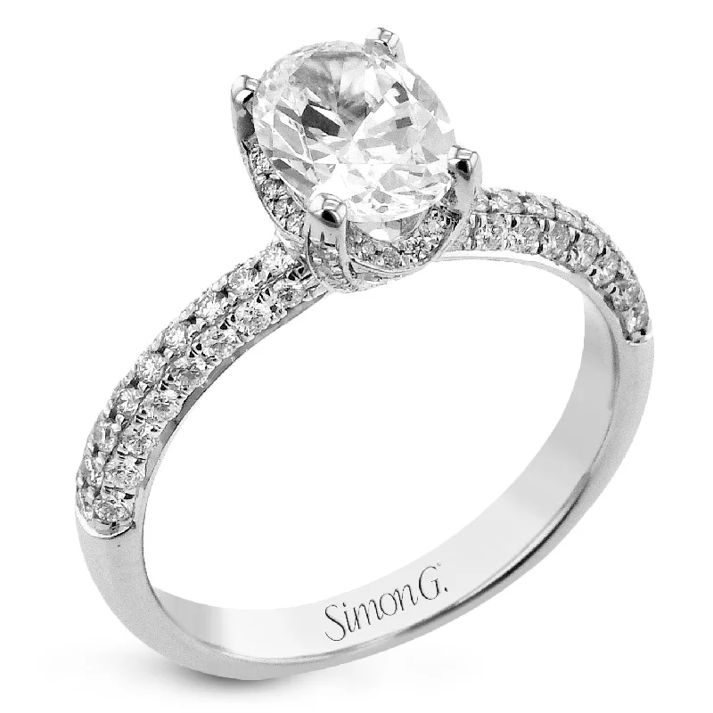 Elegant Rose Gold Jewelry For A Stylish Touch Oval-Cut Halo Engagement Ring In 18k Gold With Diamonds Elegant Rose Gold Jewelry For A Stylish Touch Oval-Cut Halo Engagement Ring In 18k Gold With Diamonds