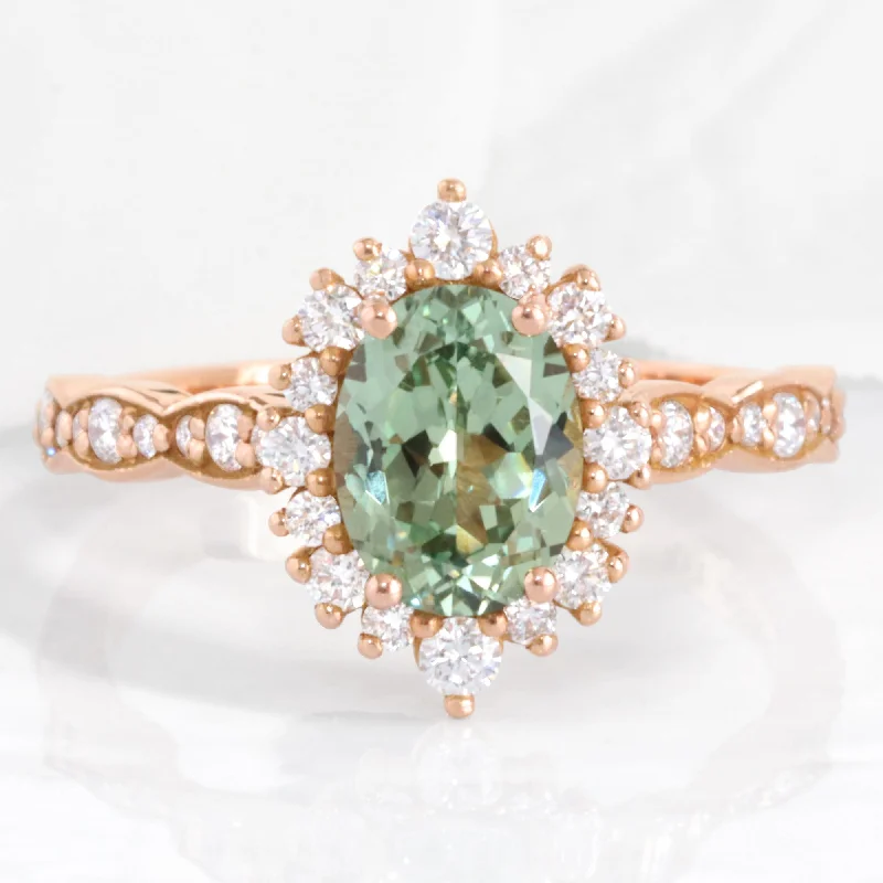 Shop High-Quality Jewelry At Jaw-Dropping Discounts Oval Green Sapphire Engagement Ring in Tiara Halo Diamond Scalloped Band Shop High-Quality Jewelry At Jaw-Dropping Discounts Oval Green Sapphire Engagement Ring in Tiara Halo Diamond Scalloped Band