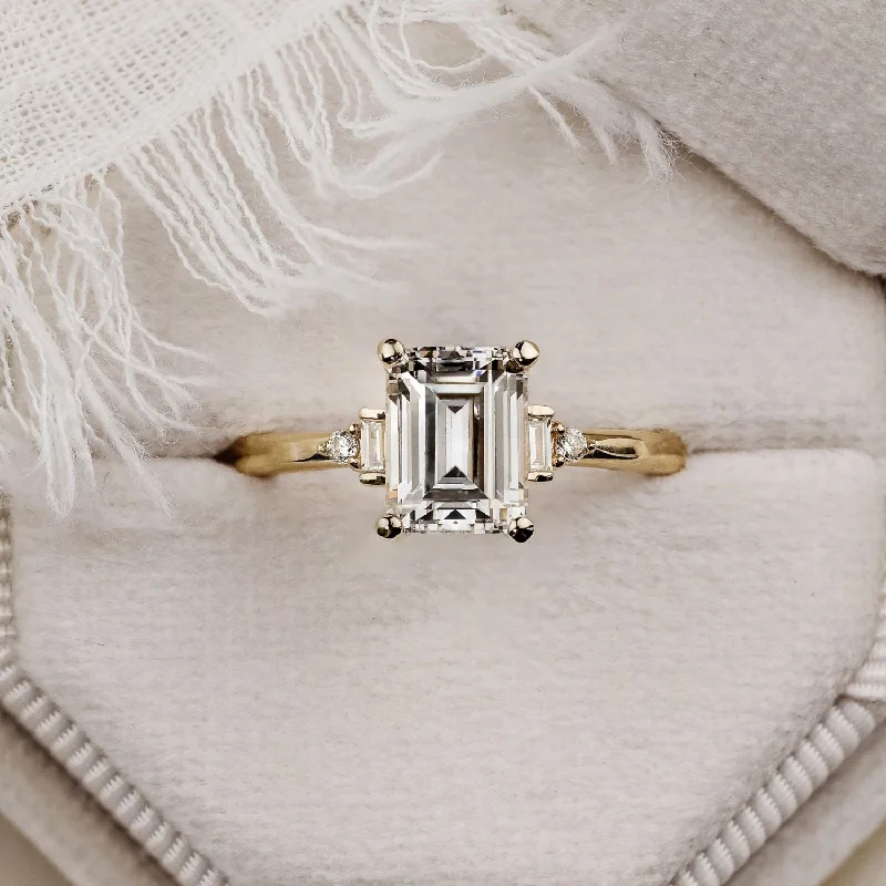 Premium Jewelry Now Available At Special Discounts The Isabella - Emerald Diamond Engagement Ring with Baguette and Round Diamond Accents Premium Jewelry Now Available At Special Discounts The Isabella - Emerald Diamond Engagement Ring with Baguette and Round Diamond Accents
