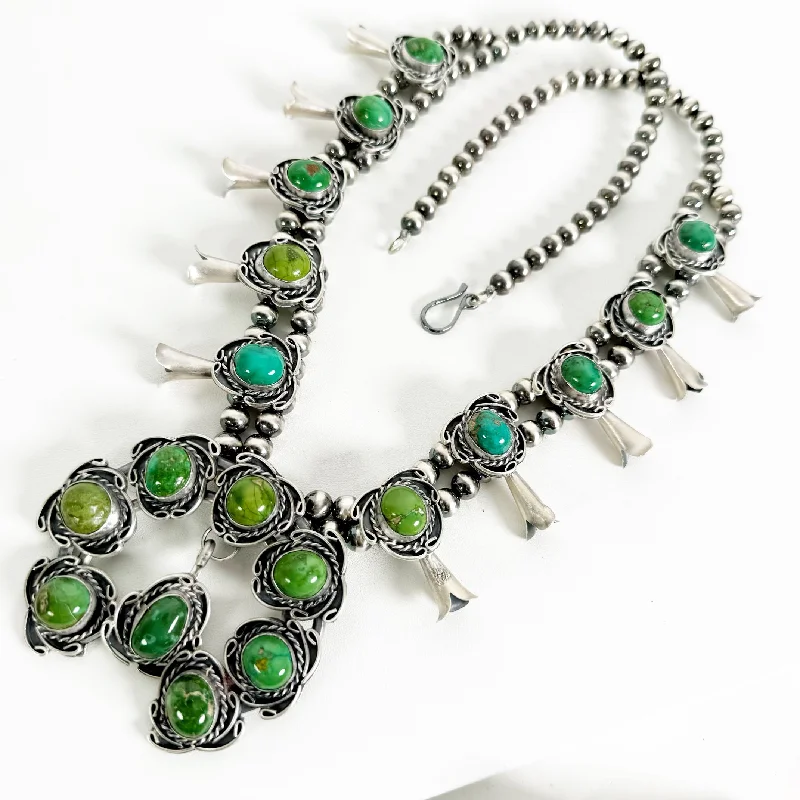 Shop Signature Jewelry Styles At Exclusive Prices Pixie Turquoise Squashblossom by Gilbert Nez Shop Signature Jewelry Styles At Exclusive Prices Pixie Turquoise Squashblossom by Gilbert Nez
