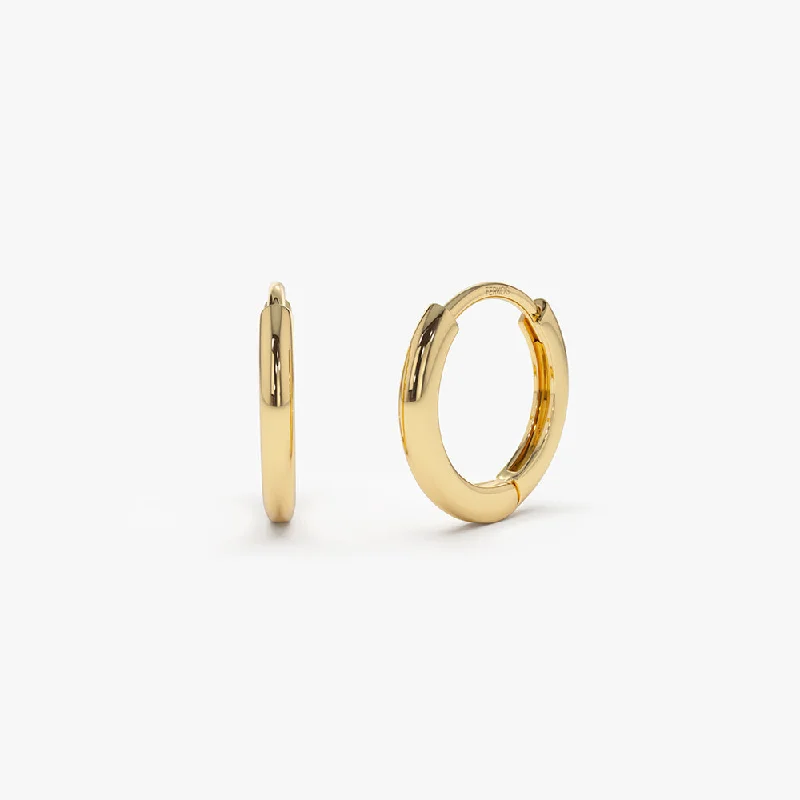 Must-Have Jewelry Pieces At Reduced Prices 14k Gold Mini Plain Huggies