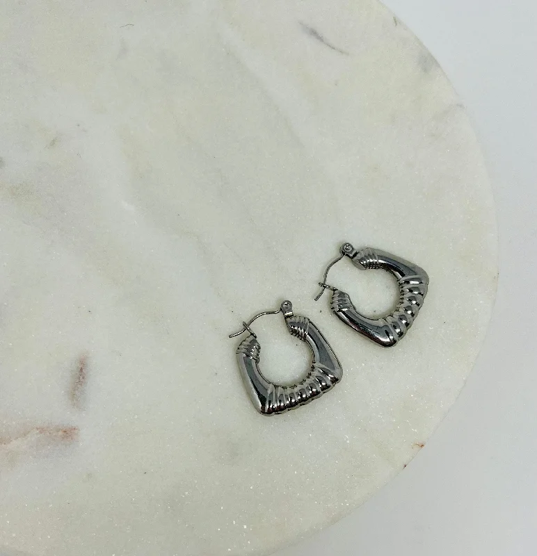 Shop Jewelry That Shines Without The High Price Retro Hoop Earrings - Angle Stainless Shop Jewelry That Shines Without The High Price Retro Hoop Earrings - Angle Stainless